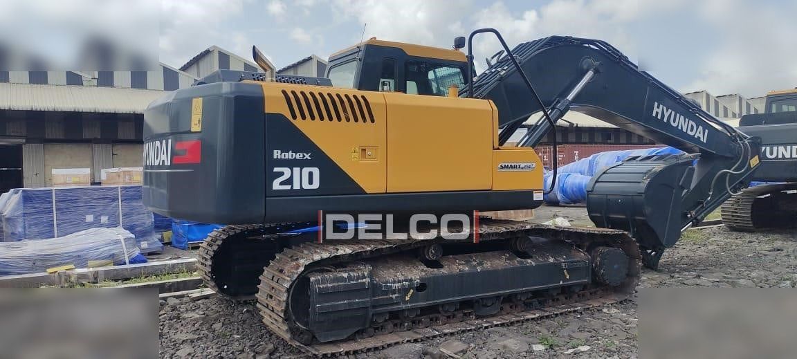 2026 Hyundai Robex 210 crawler excavator, rear three-quarter view