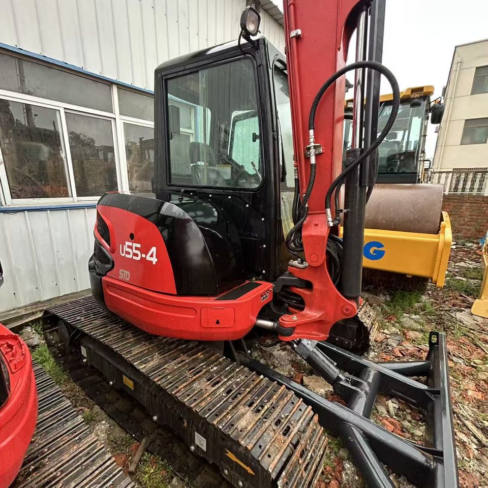 2023 Kubota U55-4 mini excavator, side profile view