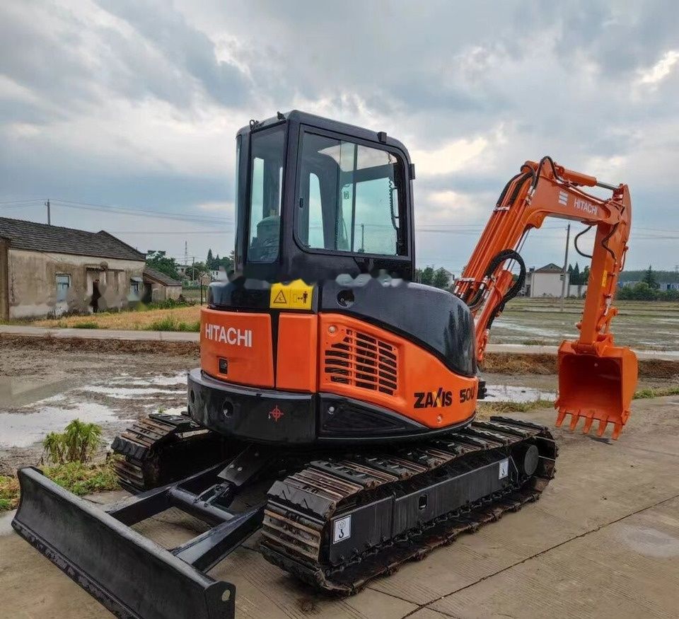Hitachi Zaxis 50U mini excavator, rear three-quarter view