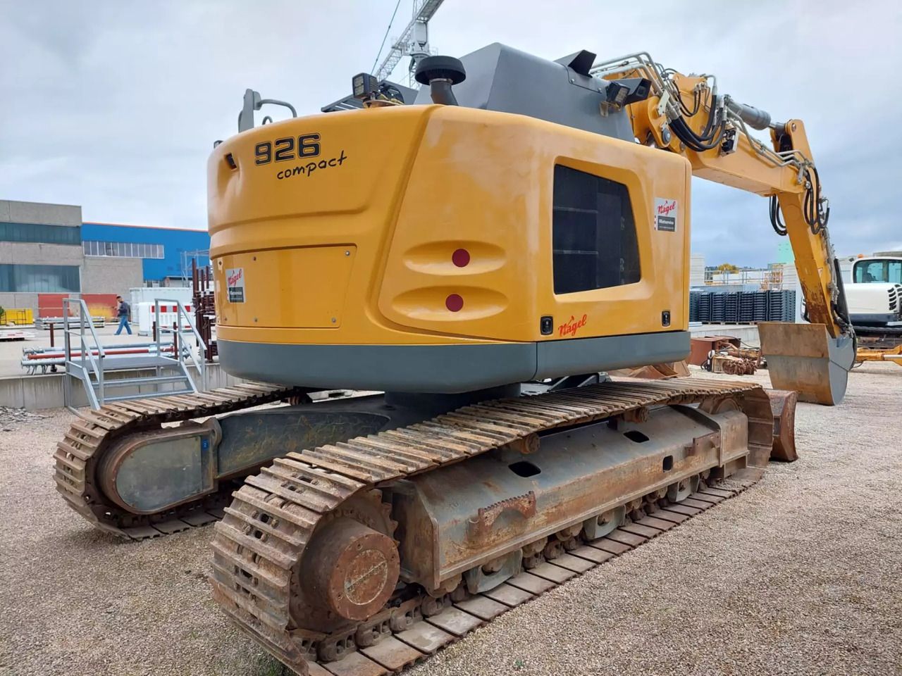 2018 Liebherr R926 Compact crawler excavator, rear three-quarter view 2018 Liebherr R926 Compact crawler excavator, rear three-quarter view