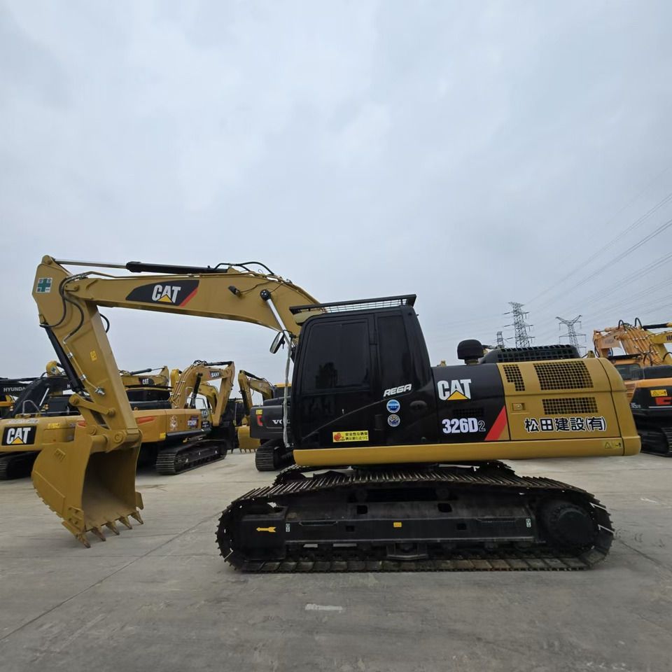 2022 Caterpillar 326D2 crawler excavator, side view 2022 Caterpillar 326D2 crawler excavator, side view