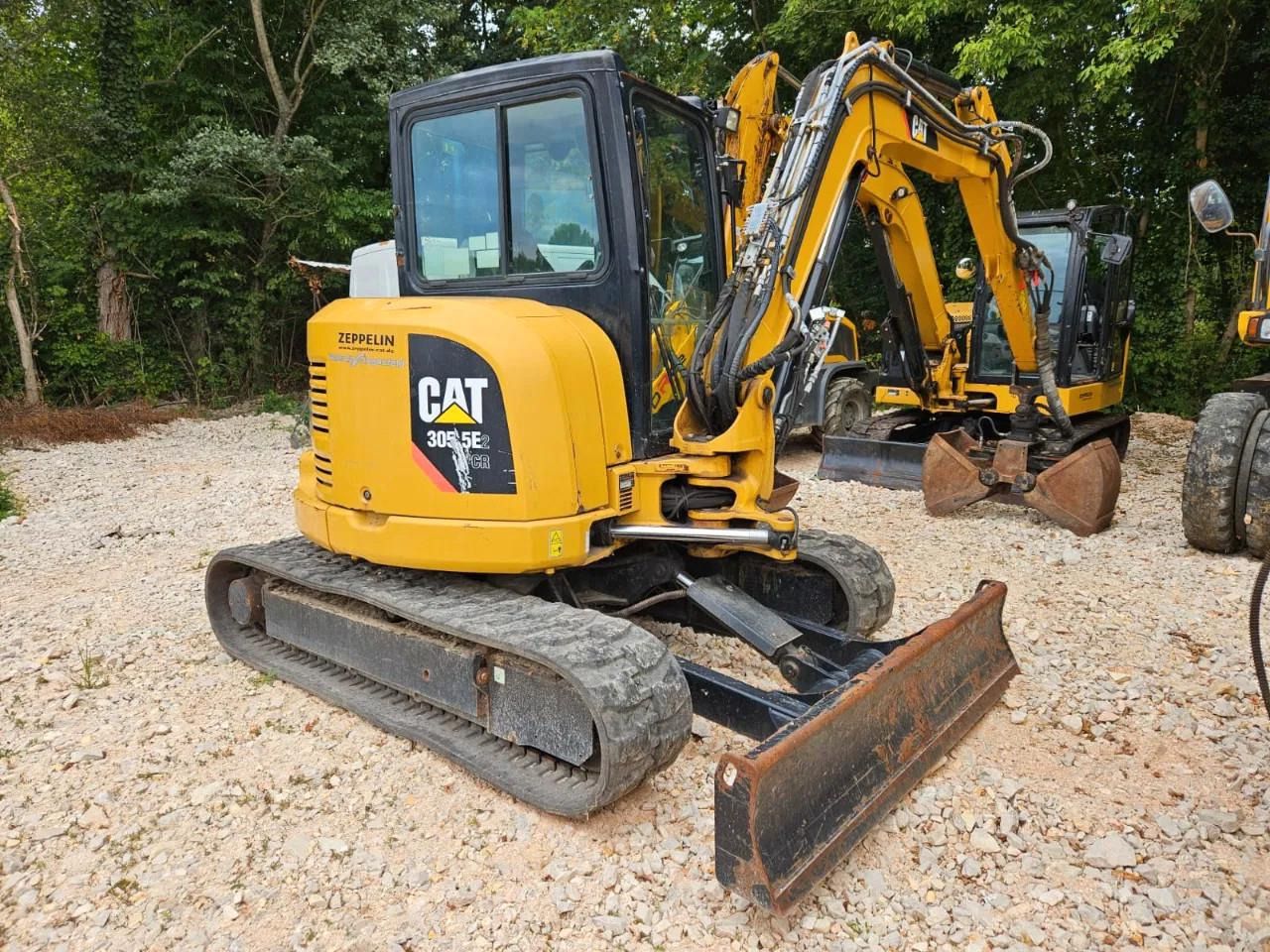 2018 Caterpillar 305.5E2 mini excavator, rear three-quarter view