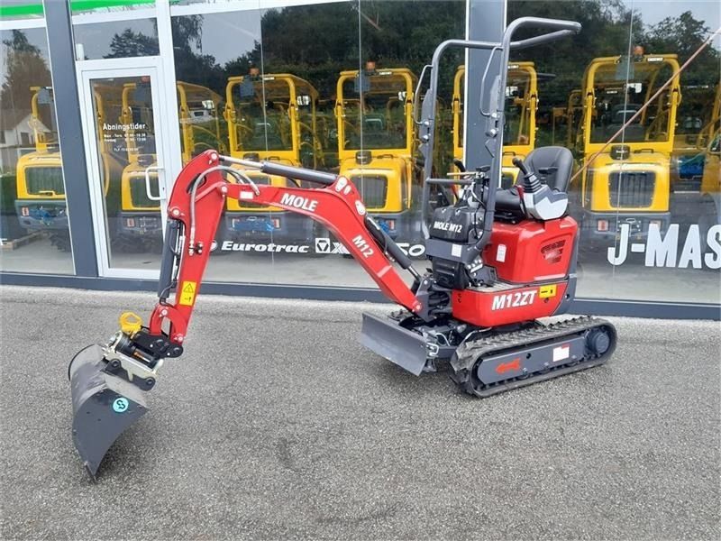Mole M12 mini excavator, side view Mole M12 mini excavator, side view
