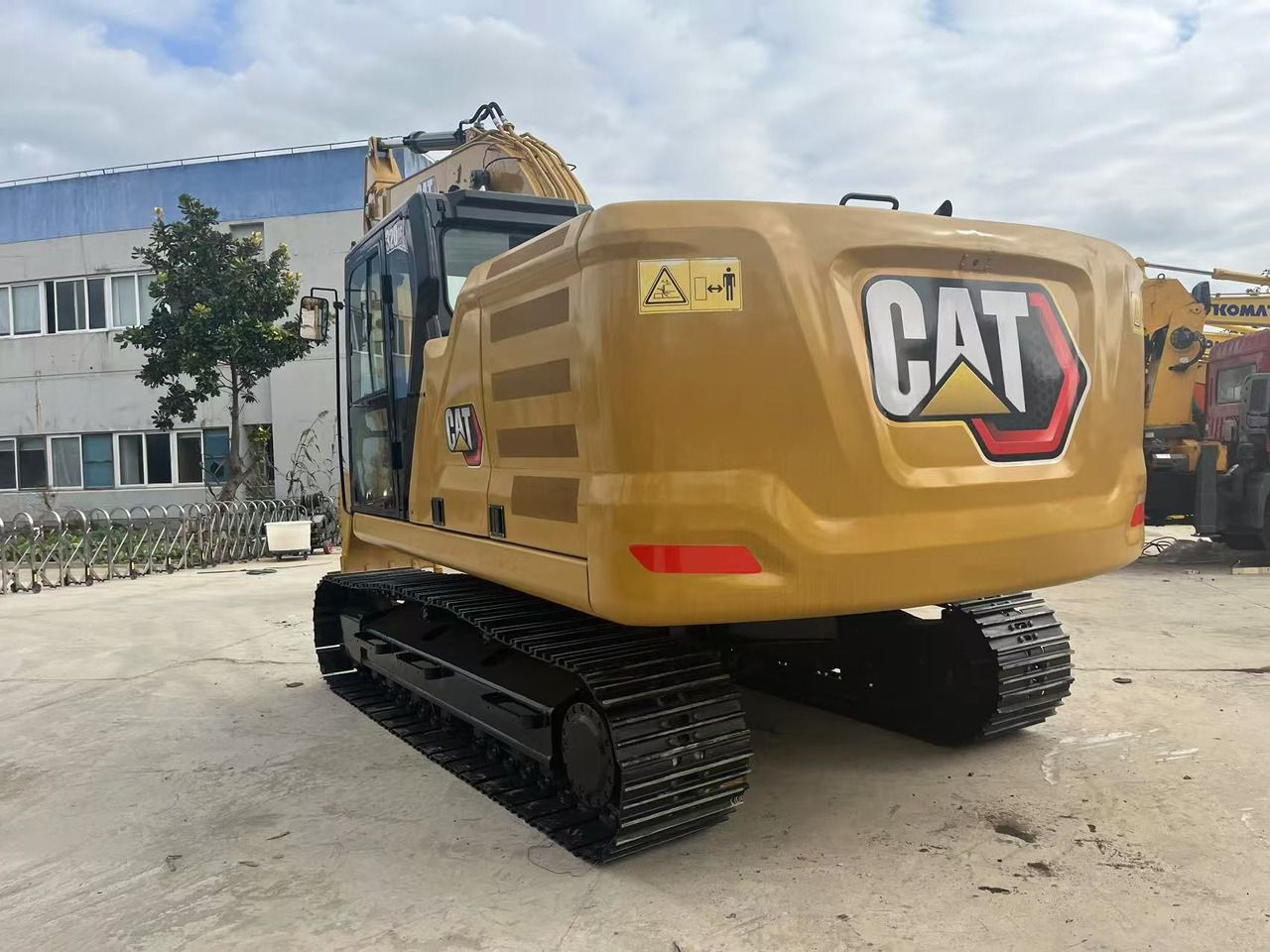 2024 Caterpillar 320GC crawler excavator, rear three-quarter view 2024 Caterpillar 320GC crawler excavator, rear three-quarter view
