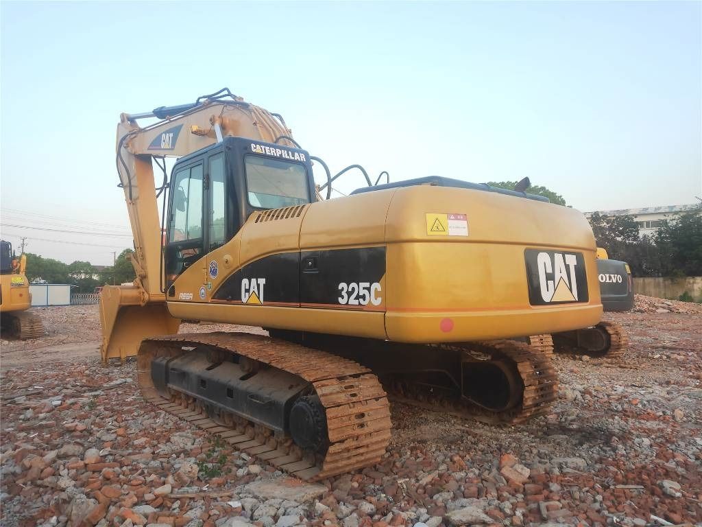 2021 Caterpillar 325C crawler excavator, rear three-quarter view 2021 Caterpillar 325C crawler excavator, rear three-quarter view