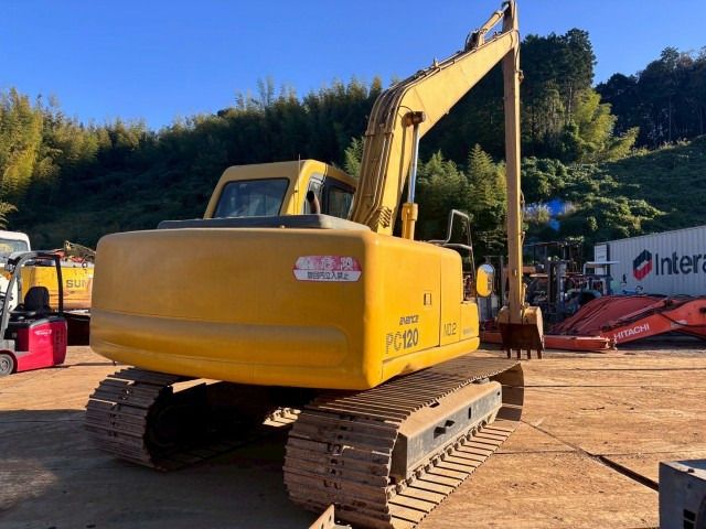 1994 Komatsu PC120-6 crawler excavator, rear three-quarter view 1994 Komatsu PC120-6 crawler excavator, rear three-quarter view