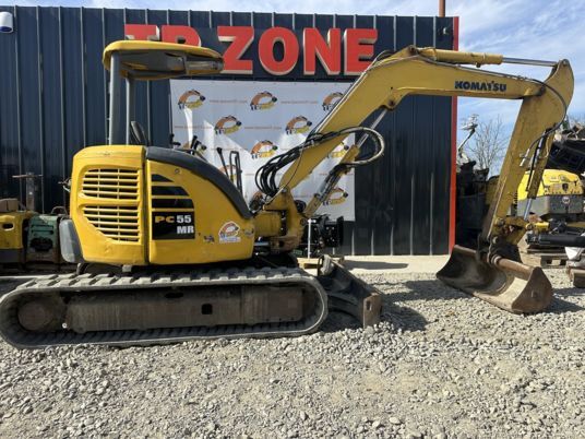2014 Komatsu PC55MR-3 mini excavator side view 2014 Komatsu PC55MR-3 mini excavator side view