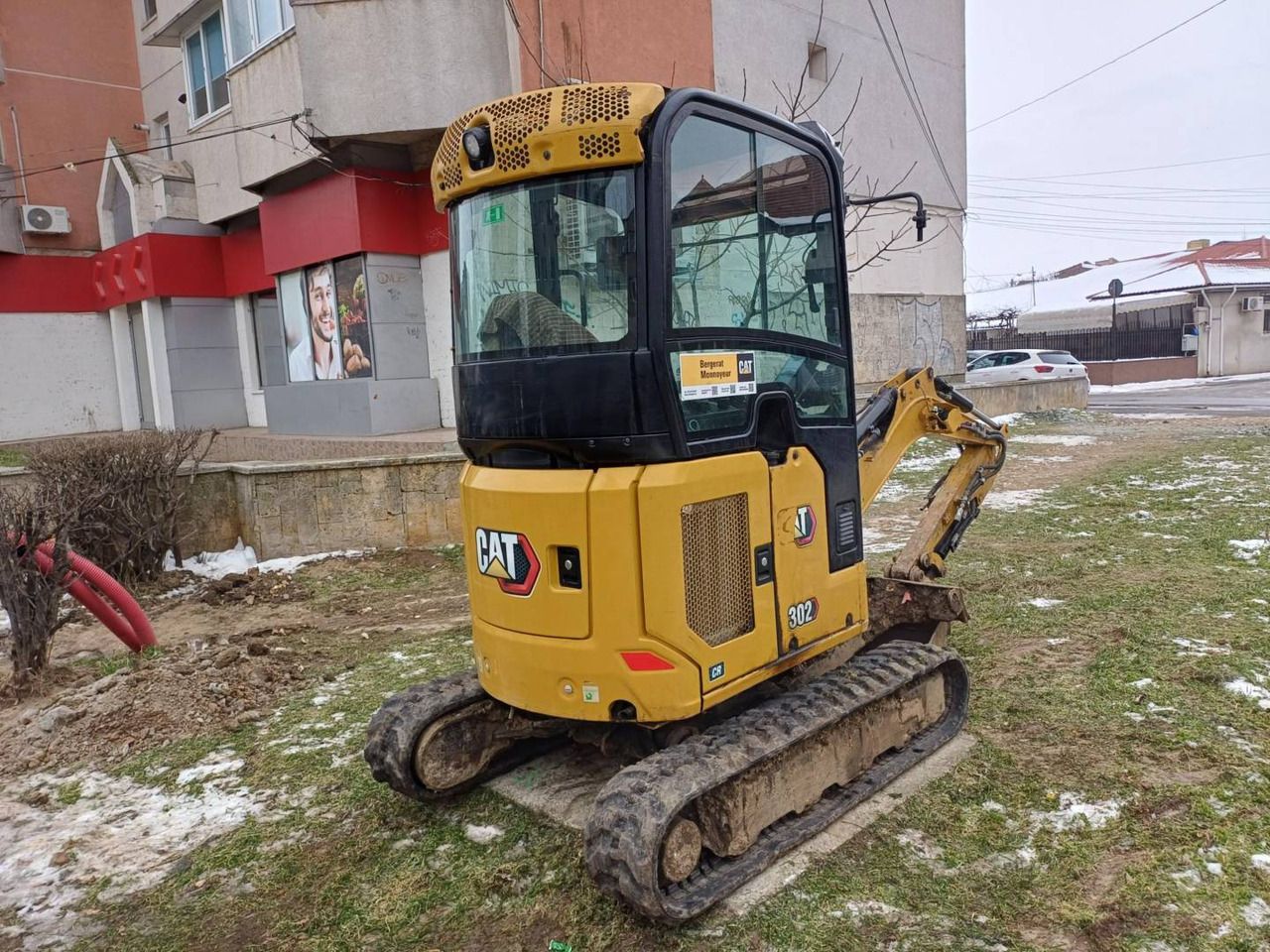2021 Caterpillar 302-05CR crawler excavator, rear three-quarter view 2021 Caterpillar 302-05CR crawler excavator, rear three-quarter view