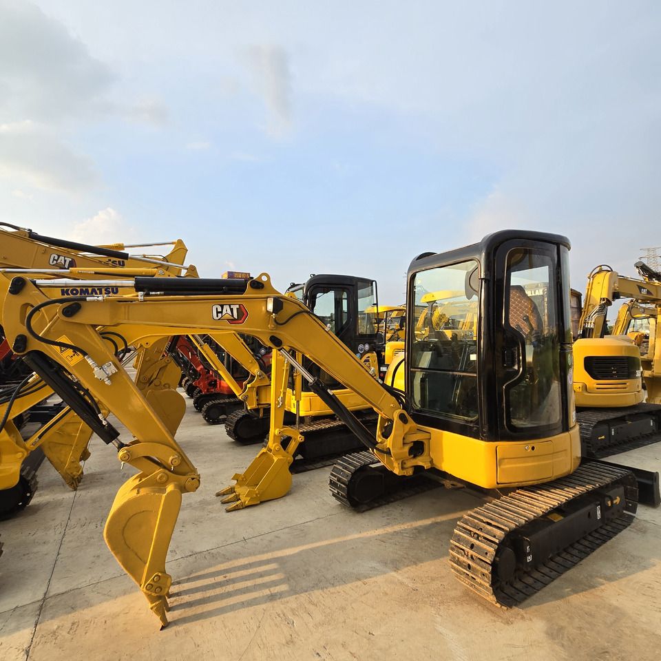 2021 Caterpillar 303.5E mini excavator, front three-quarter view 2021 Caterpillar 303.5E mini excavator, front three-quarter view