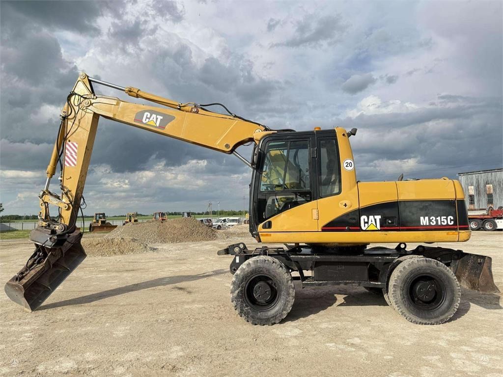 2006 Caterpillar M315C wheel excavator, side profile view