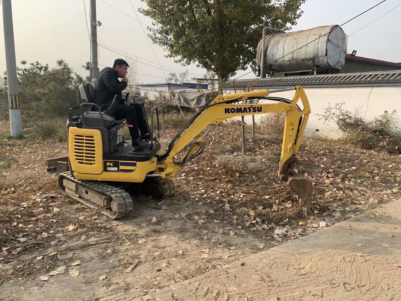 2016 Komatsu PC18MR crawler excavator side view 2016 Komatsu PC18MR crawler excavator side view