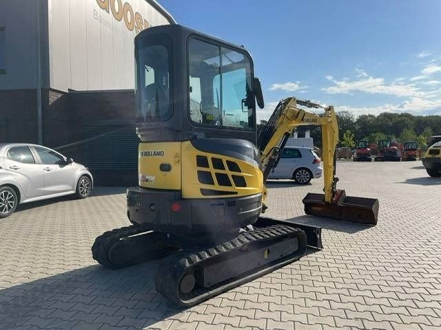 2014 New Holland E 29 B SR mini excavator, rear three-quarter view