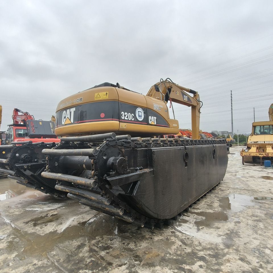 2021 Caterpillar 320C amphibious excavator, rear three-quarter view 2021 Caterpillar 320C amphibious excavator, rear three-quarter view