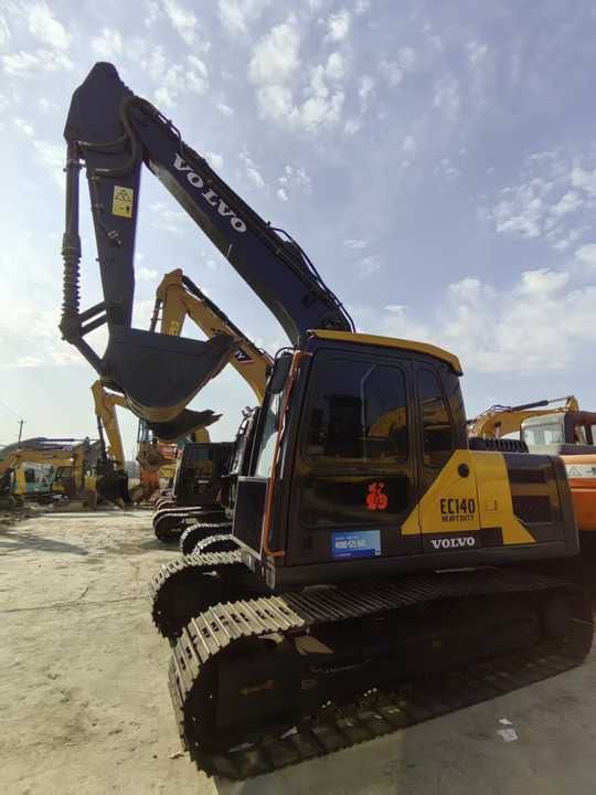 2023 Volvo EC140 crawler excavator, side view