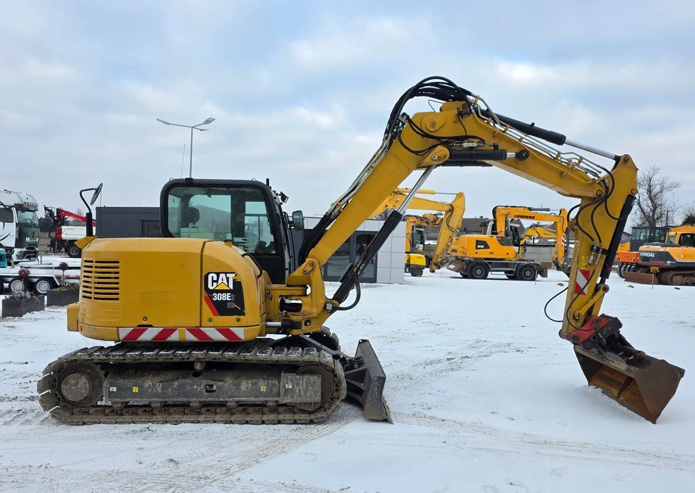 2016 Caterpillar 308E2CR crawler excavator, side view 2016 Caterpillar 308E2CR crawler excavator, side view