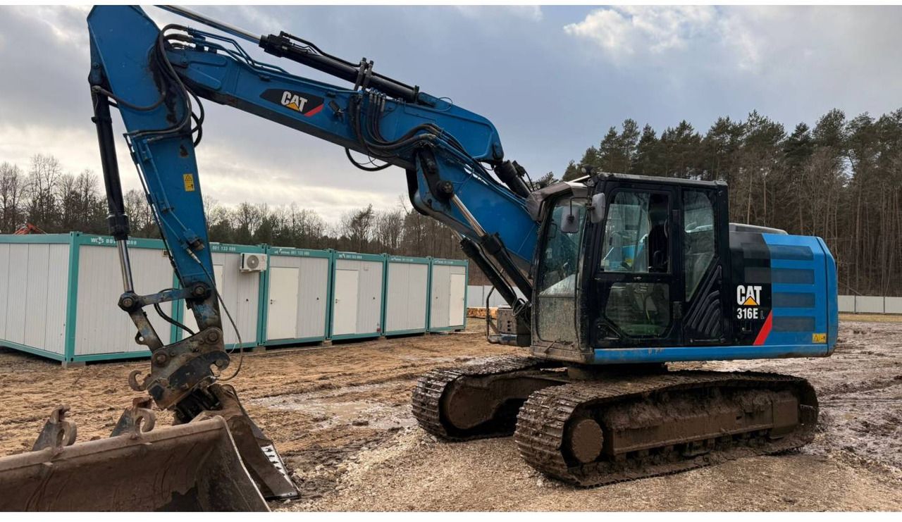 2013 Caterpillar 316EL crawler excavator, side view