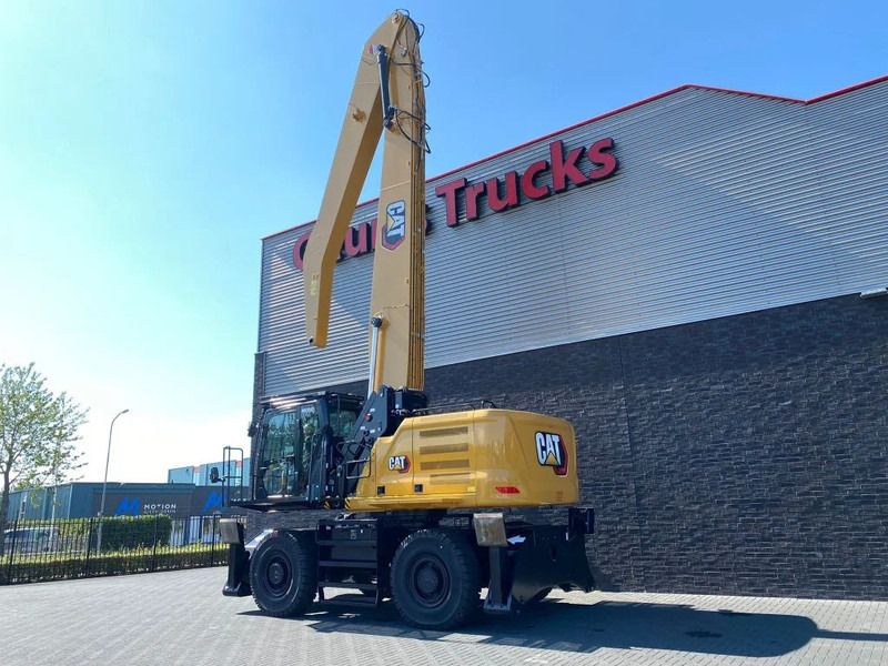 2022 Caterpillar MH3040 material handler, rear three-quarter view 2022 Caterpillar MH3040 material handler, rear three-quarter view