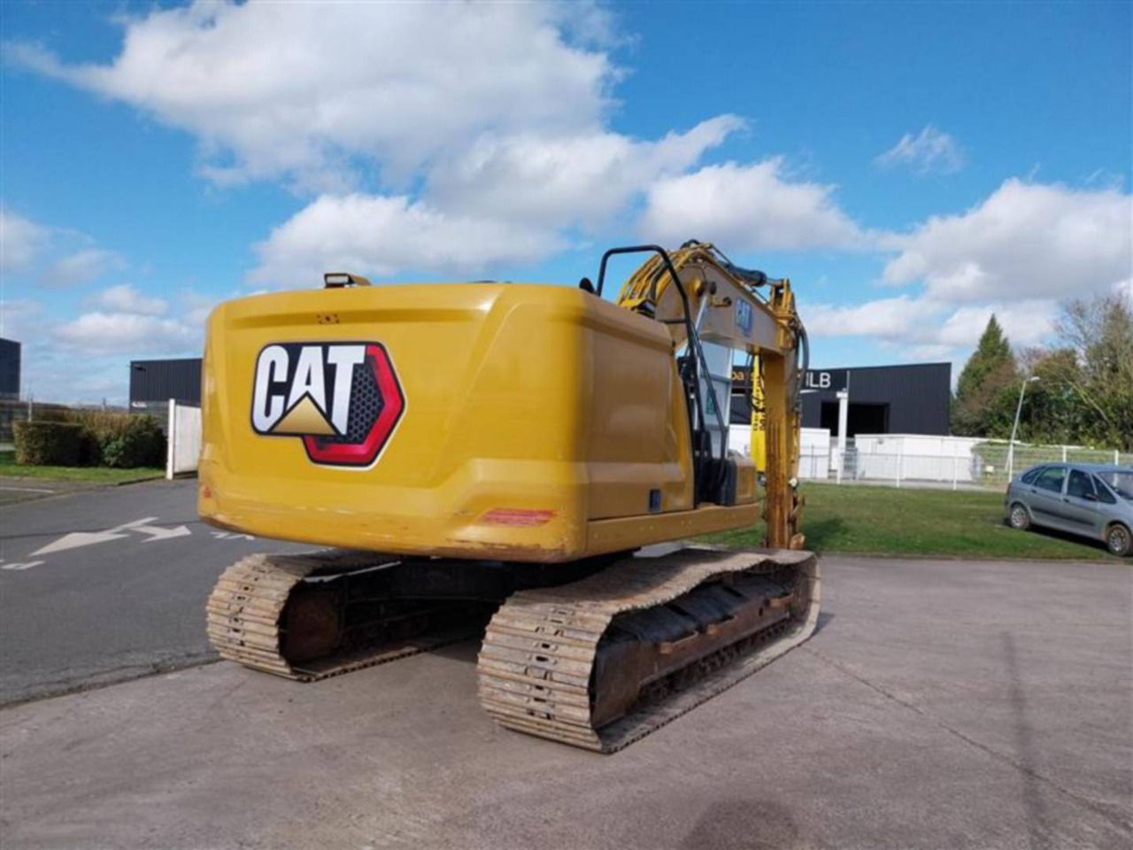2021 Caterpillar 323 crawler excavator, rear three-quarter view 2021 Caterpillar 323 crawler excavator, rear three-quarter view
