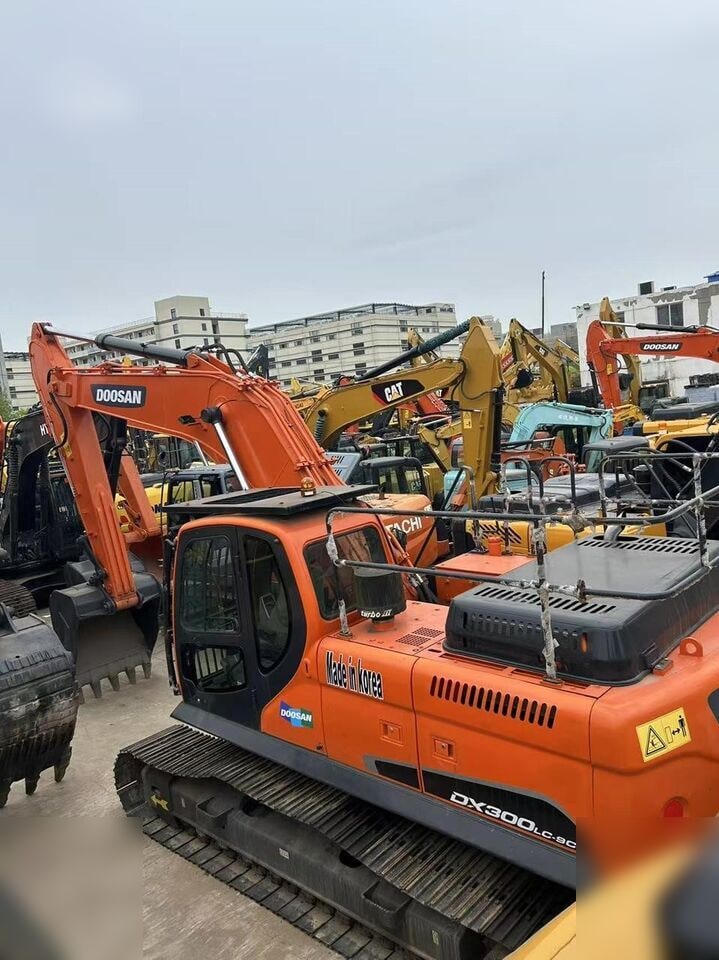2021 Doosan DX300LC-9C crawler excavator, rear three-quarter view
