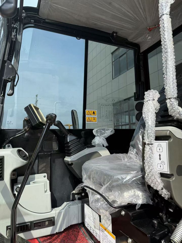 2024 Caterpillar 305.5E2 mini excavator interior view