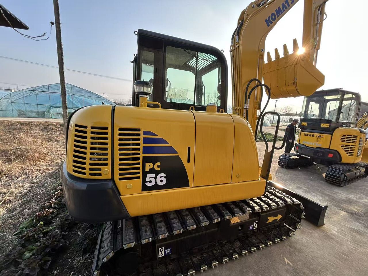 2024 Komatsu PC56 mini excavator, rear three-quarter view 2024 Komatsu PC56 mini excavator, rear three-quarter view