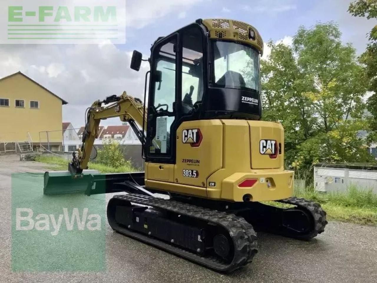2023 Caterpillar 303.5CR mini excavator, rear three-quarter view