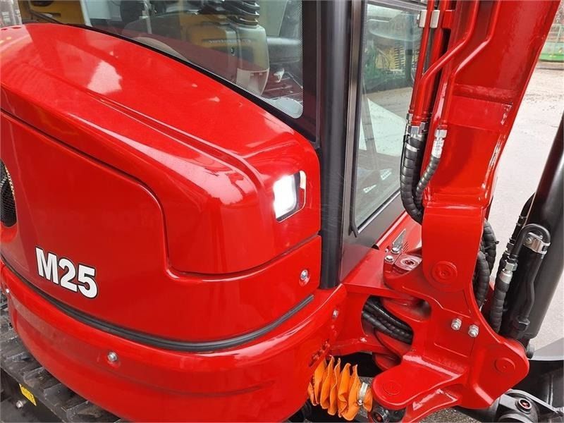 2025 Mole M25 mini excavator, close-up of cab and boom 2025 Mole M25 mini excavator, close-up of cab and boom