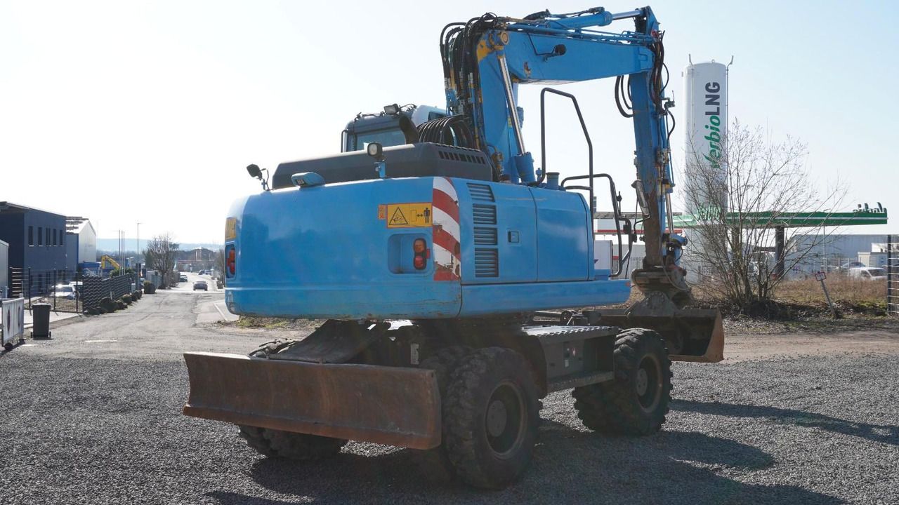 2013 Komatsu PW160-8 wheel excavator, rear three-quarter view 2013 Komatsu PW160-8 wheel excavator, rear three-quarter view