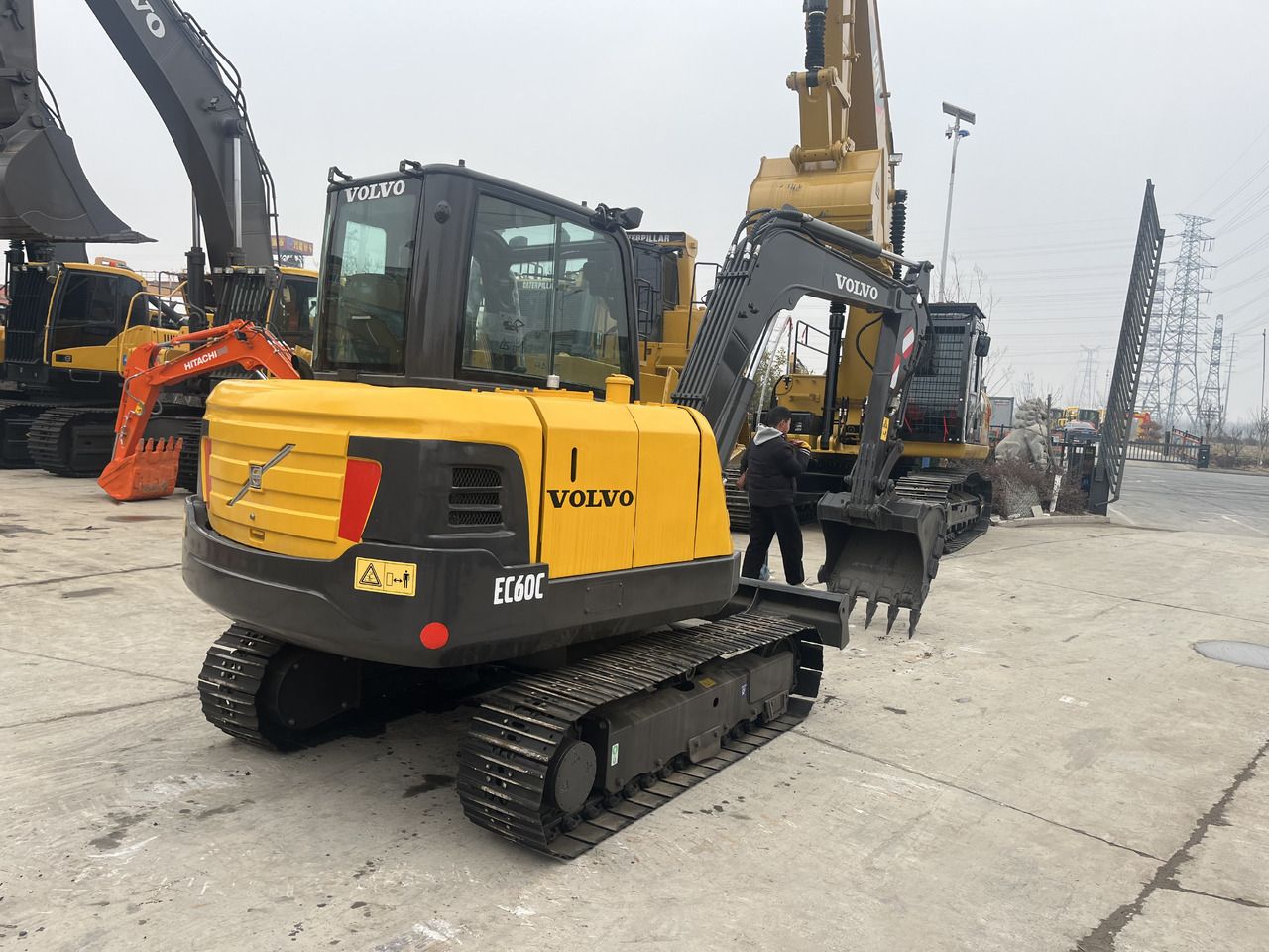 2023 Volvo EC60C mini excavator, rear three-quarter view 2023 Volvo EC60C mini excavator, rear three-quarter view