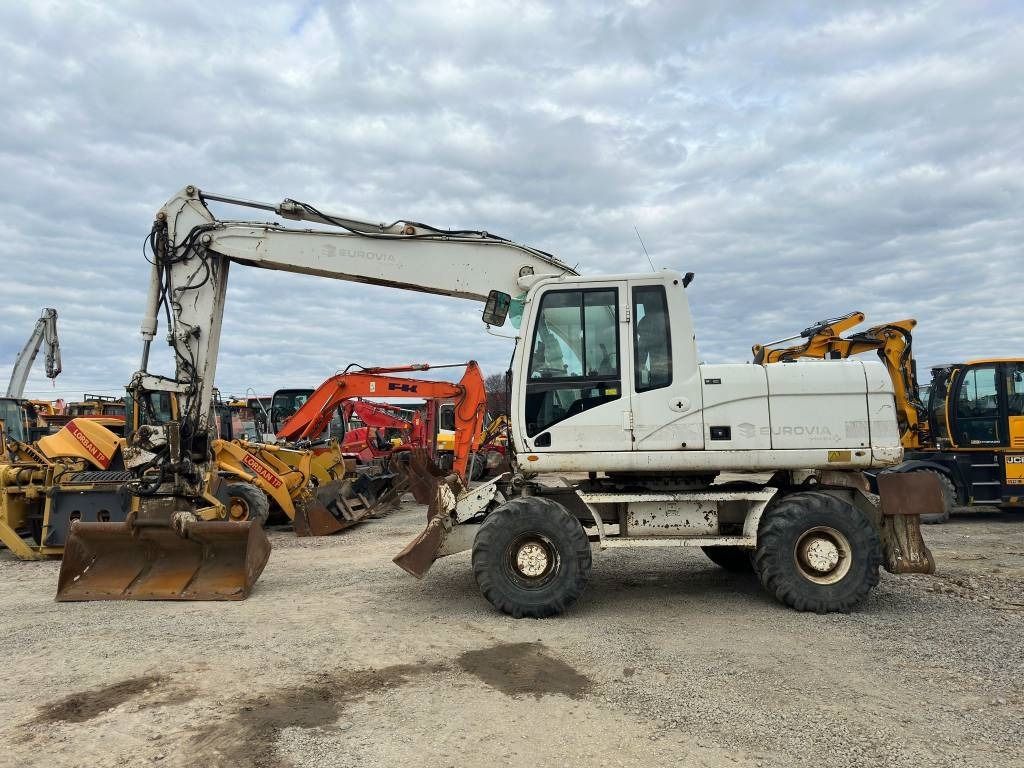 2009 Caterpillar M316D wheel excavator, side view 2009 Caterpillar M316D wheel excavator, side view