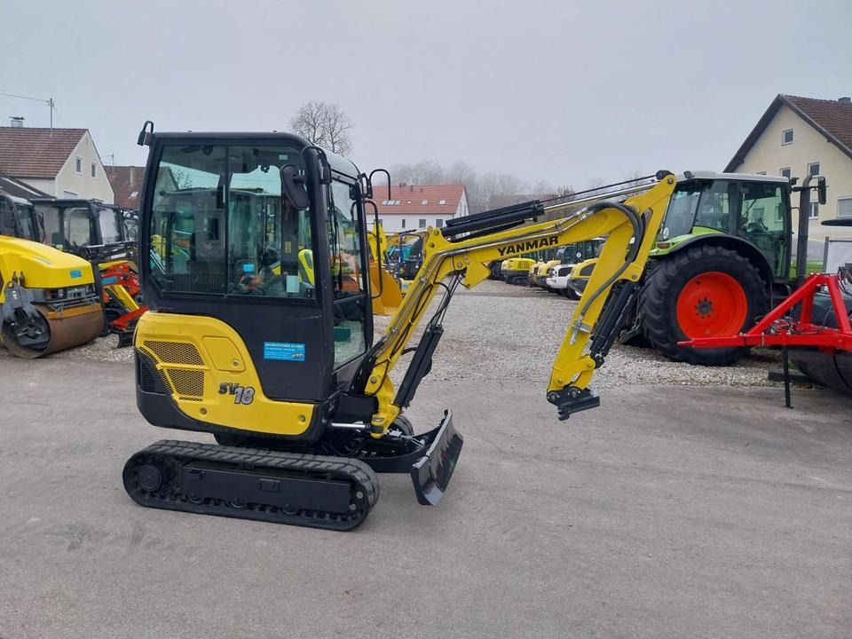 2019 Takeuchi SV 18 mini excavator, side view 2019 Takeuchi SV 18 mini excavator, side view