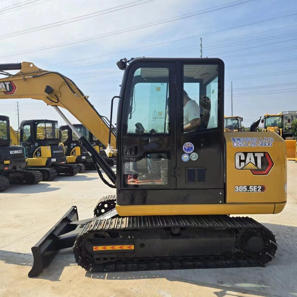 2022 Caterpillar 305.5E2 mini excavator, side profile view
