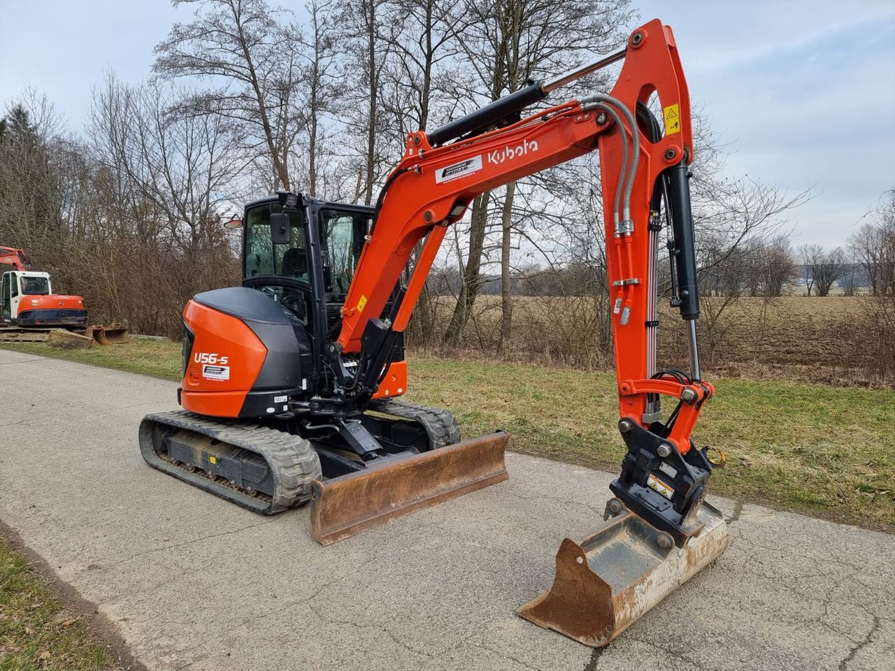 2024 Kubota U56-5 mini excavator, side profile view