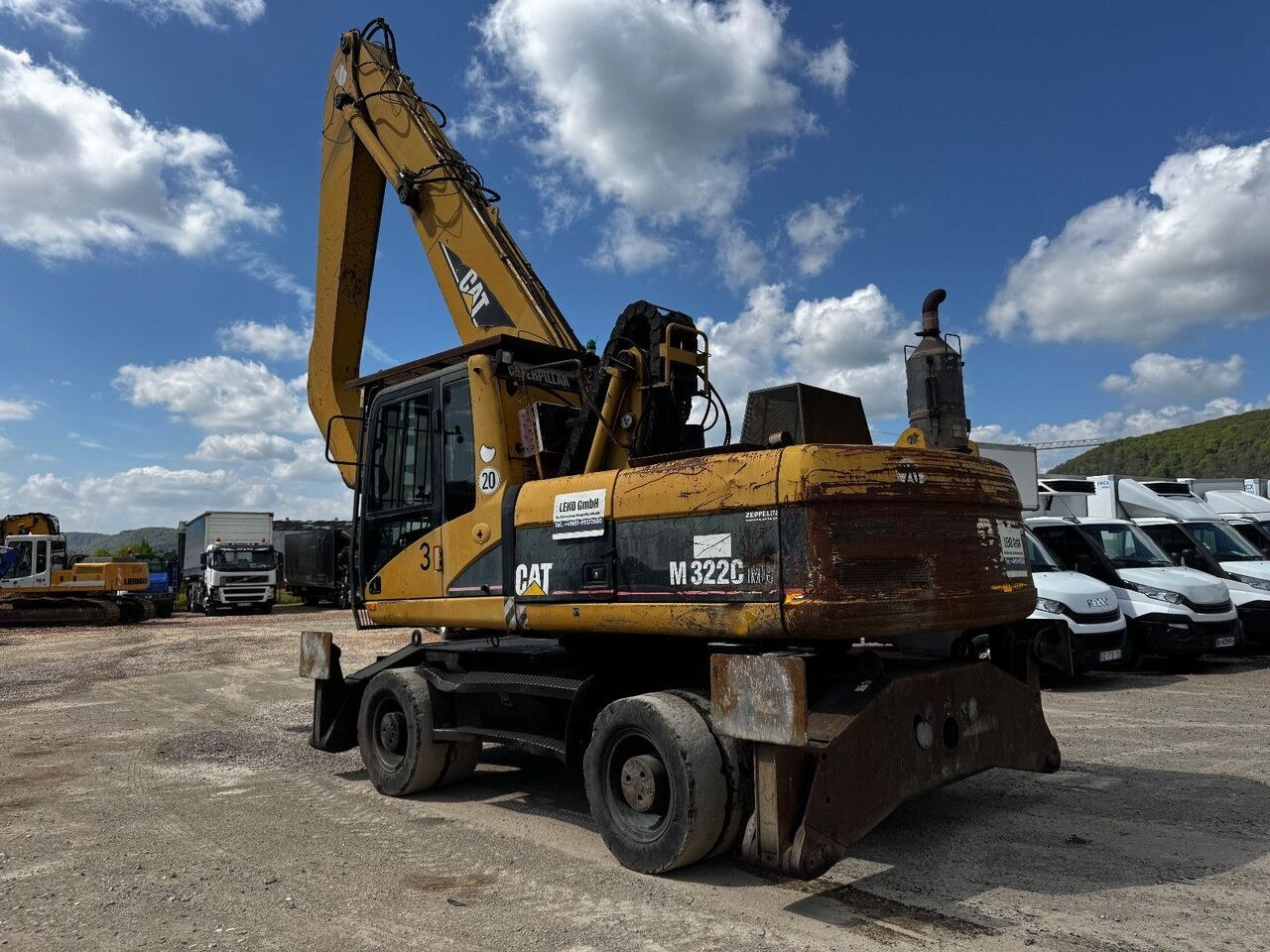 2005 Caterpillar M322C MH material handler, rear three-quarter view 2005 Caterpillar M322C MH material handler, rear three-quarter view