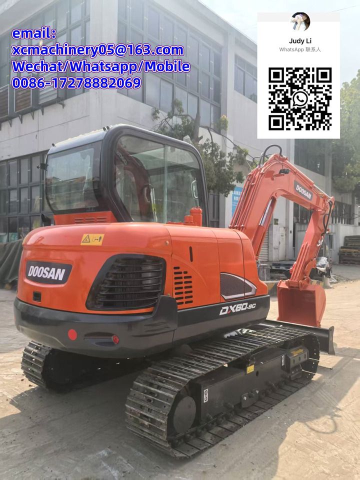 2023 Doosan DX60-9C mini excavator, rear three-quarter view 2023 Doosan DX60-9C mini excavator, rear three-quarter view