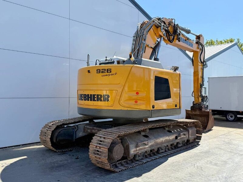 2015 Liebherr R 926 Compact crawler excavator, rear three-quarter view 2015 Liebherr R 926 Compact crawler excavator, rear three-quarter view