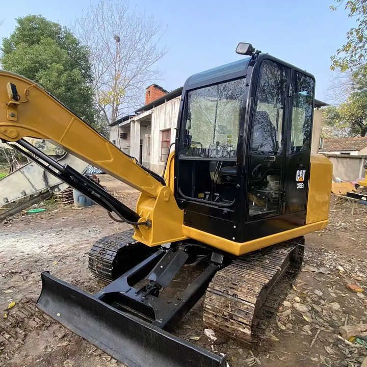 2011 Caterpillar 306E crawler excavator, side view 2011 Caterpillar 306E crawler excavator, side view