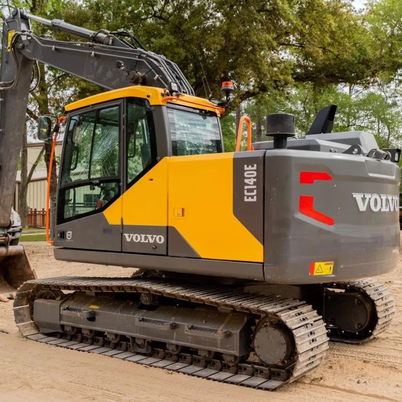 Volvo EC140E crawler excavator, rear three-quarter view Volvo EC140E crawler excavator, rear three-quarter view