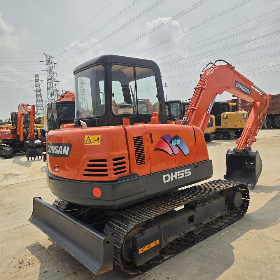 2021 Doosan DH55 mini excavator, rear three-quarter view
