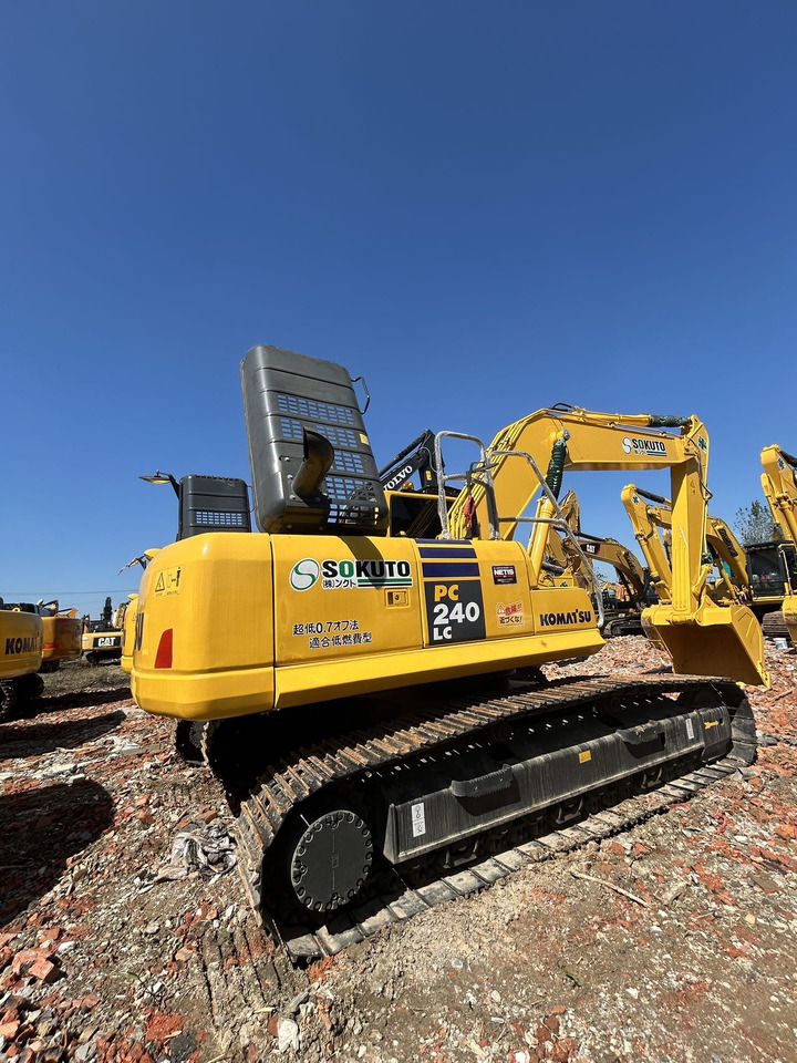2023 Komatsu PC240LC-8 crawler excavator, rear three-quarter view 2023 Komatsu PC240LC-8 crawler excavator, rear three-quarter view