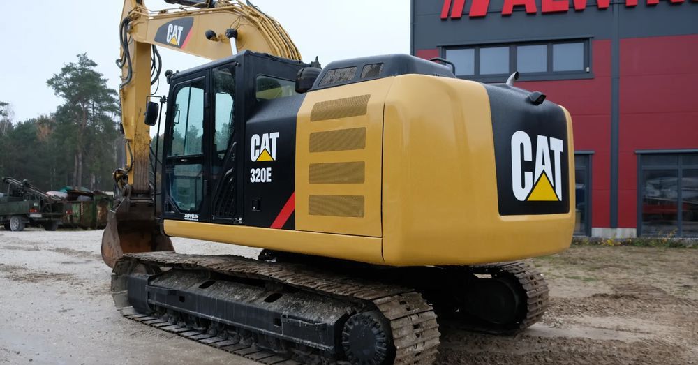 2012 Caterpillar 320E crawler excavator, rear three-quarter view 2012 Caterpillar 320E crawler excavator, rear three-quarter view