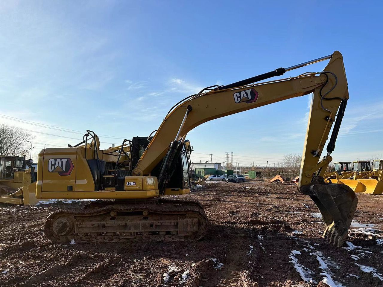 2021 Caterpillar 320GC crawler excavator, side profile view