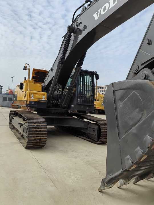 2021 Volvo EC210 crawler excavator, low angle side view 2021 Volvo EC210 crawler excavator, low angle side view