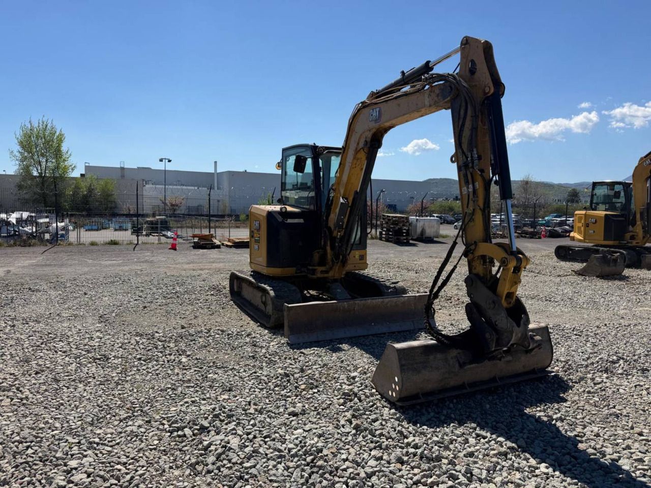 2023 Caterpillar 305 crawler excavator, front three-quarter view