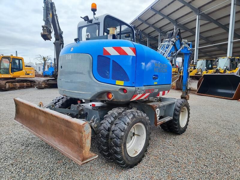 2017 Wacker Neuson EW100 wheel excavator, rear three-quarter view 2017 Wacker Neuson EW100 wheel excavator, rear three-quarter view