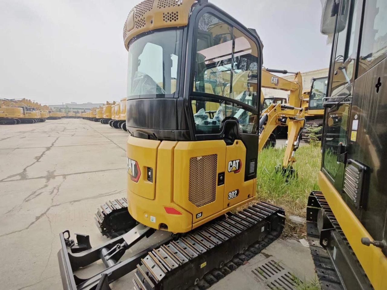 2026 Caterpillar 302CR mini excavator, front three-quarter view 2026 Caterpillar 302CR mini excavator, front three-quarter view