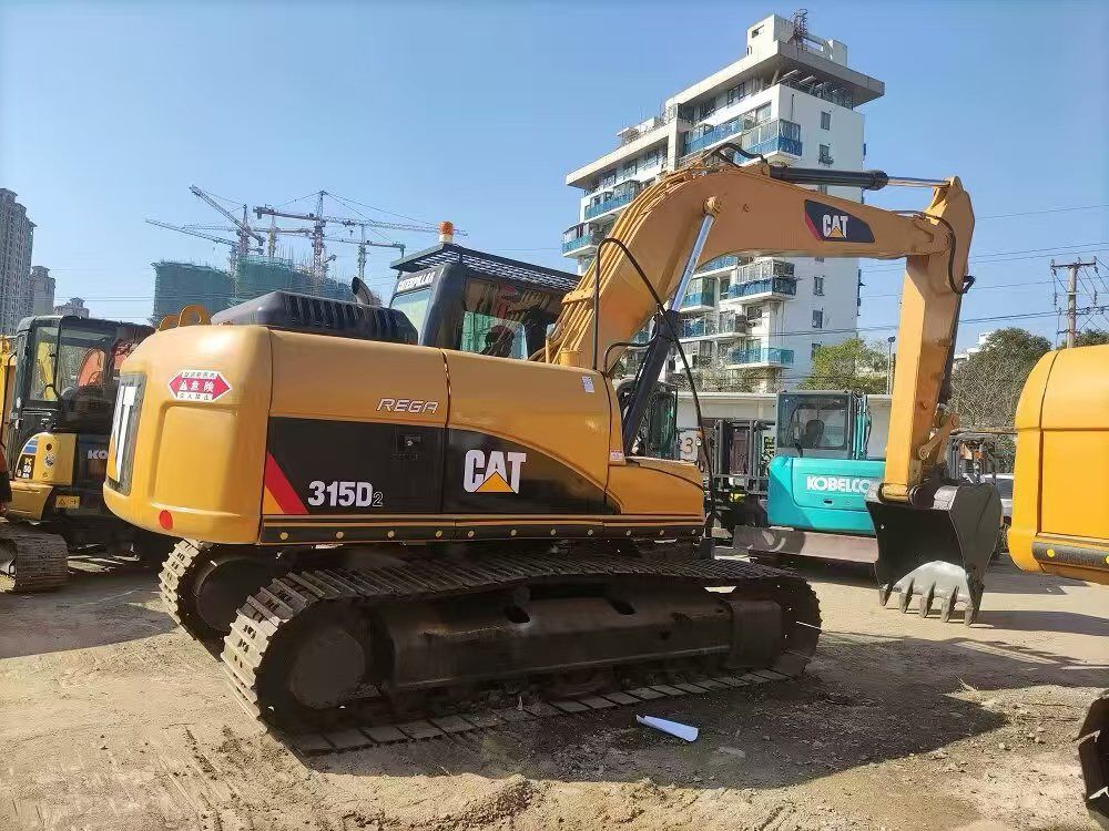 2020 Caterpillar 315D2 crawler excavator, rear three-quarter view