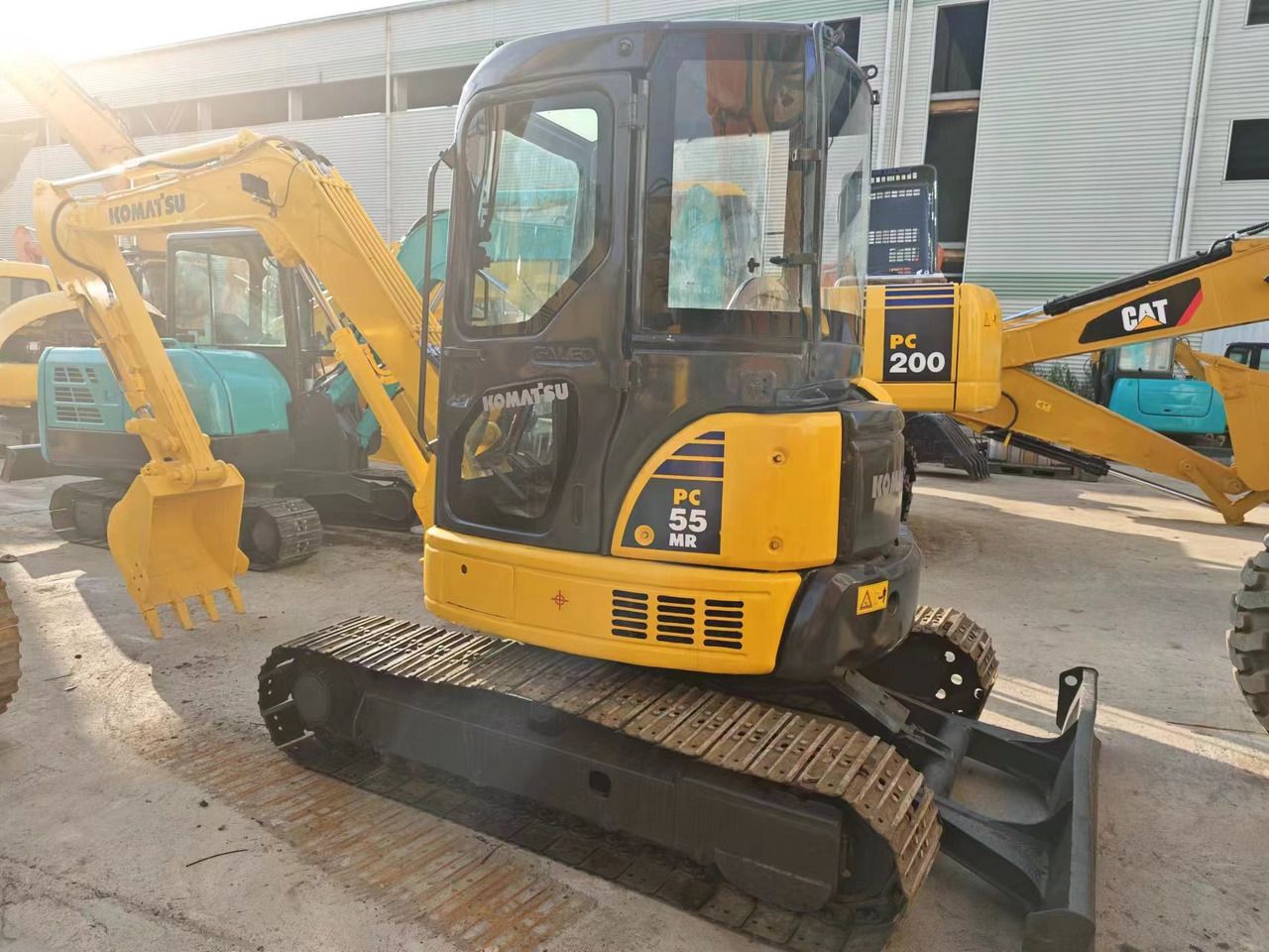 2018 Komatsu PC55MR-2 mini excavator, side view 2018 Komatsu PC55MR-2 mini excavator, side view