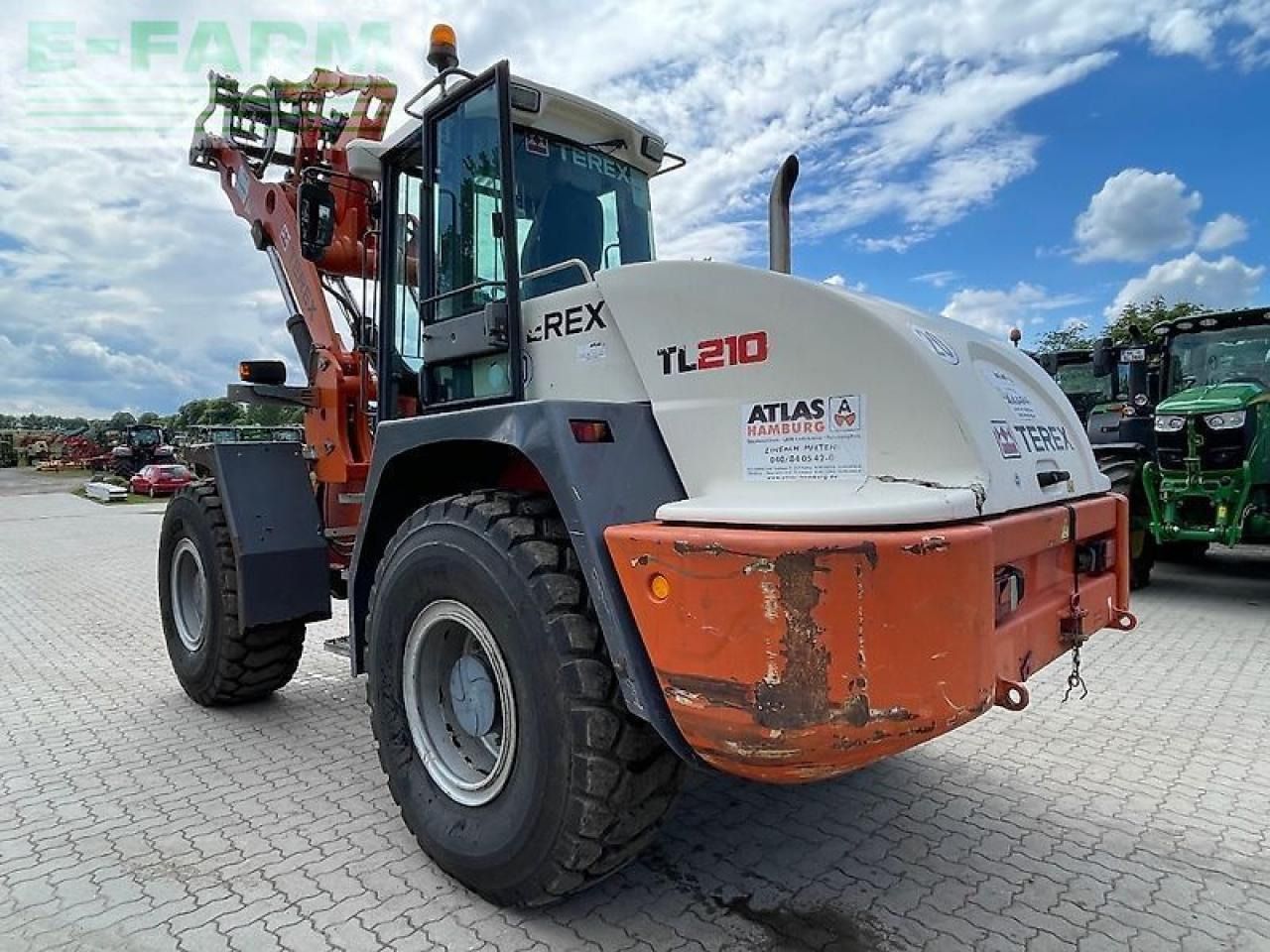 2012 Atlas TL210 wheel loader, rear three-quarter view 2012 Atlas TL210 wheel loader, rear three-quarter view