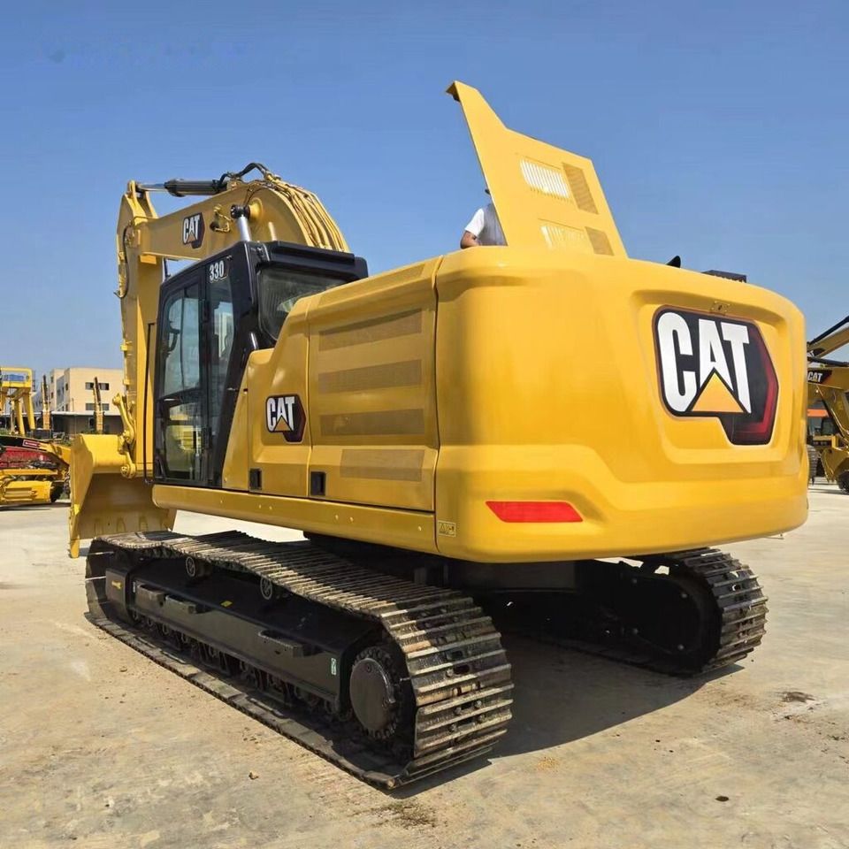 2021 Caterpillar 330GC crawler excavator, rear three-quarter view 2021 Caterpillar 330GC crawler excavator, rear three-quarter view